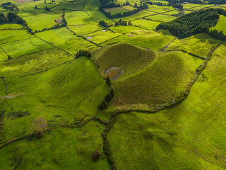 Scenic landscape with volcanic crater in Sao Miguel Island, Azores, Portugal. Aerial drone view of panoramic Acores islands