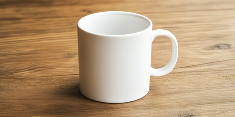 Close-up of a white coffee mug on a plain wooden table with plenty of empty space around, emphasizing simplicity and focus