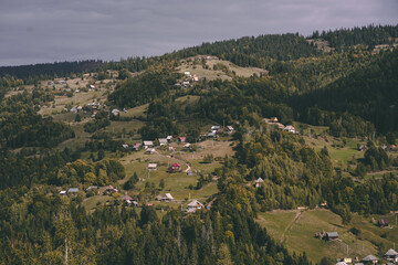 Fototapeta premium Misty Autumn Morning in a Mountain Village