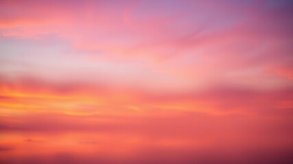 Fototapeta premium Colorful abstract sky during sunset with vivid hues of orange, pink, and purple blending together seamlessly, sunset, dusk