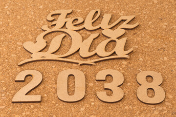 Happy new year 2038 on wooden background