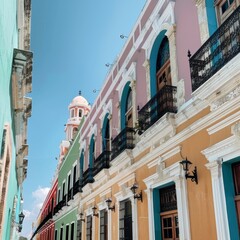 Colonial architecture in Campeche, Mexico, featuring colorful buildings and intricate facades under