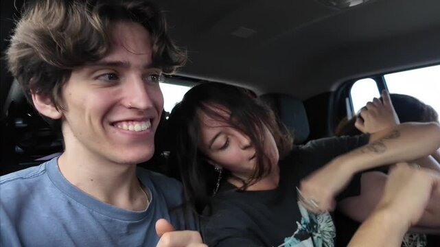Family Dancing and Enjoying Music Inside a Car