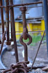antiques irons hanging on the fence of a ranch in Patagonia, Argentina