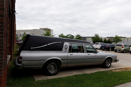 CHATTANOOGA, TN, USA-8 MAY 2021: An old (80s?) General Motors hearse, with small sign in rear window, "Last Ride".