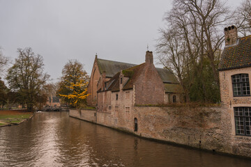 Fototapeta premium Bruges canals in Bruges, Belgium. West Flemish. West Flanders. Water reflection.