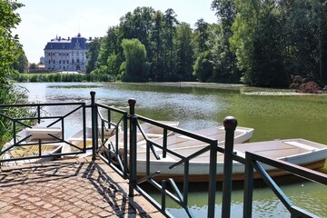 View from the marina of the park, pond and palace in Pszczyna, Poland