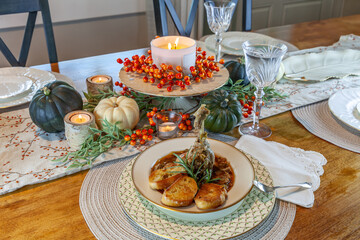 Roasted duck soup stew with garlic bread on fine China bowl and plate and silver spoon
