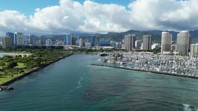 Flying over the channel between Ala Moana Harbor and  Beach Park in Honolulu on the island of Oahu, Hawaii. 