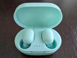 Green wireless earbuds 