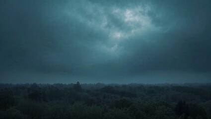 Obraz premium A Meadow Landscape With Dark Gloomy Cloudy Skies with Light Peeking Through Cloud