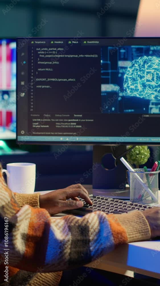 Poster vertical video african american man using ai to develop a software system with chroma key on pc, clo