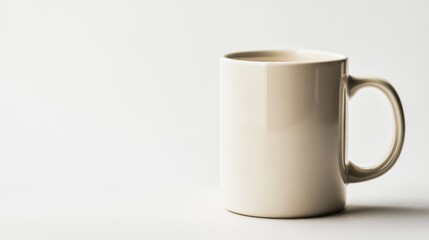 Obraz premium A simple white mug on a white background.