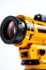Fototapeta premium A close-up view of a yellow surveying instrument lens, showcasing its intricate design and precision engineering.