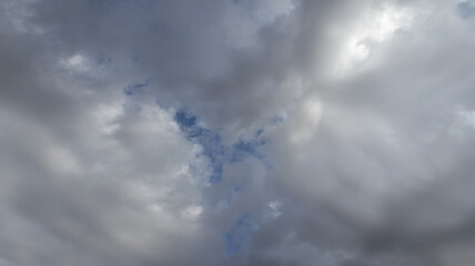 Beautiful dark dramatic sky with stormy clouds before rain or snow. Thunderstorm heaven landscape. Timelapse. High quality photo