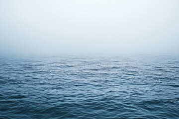 Misty Calm Waters: A Serene Ocean View Shrouded in Fog