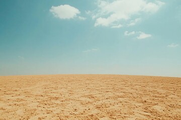 Naklejka premium Vast Desert Landscape Under a Clear Blue Sky