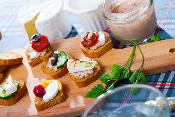 Set of various mini appetizers with vegetable, cheese and meat pate filling