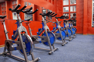 Obraz premium spinning medical sport bike, spinning class studio bikes, empty, no people