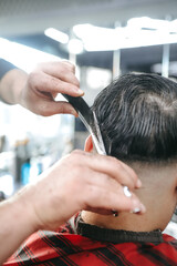 a man in barber, haircut, barber, hair style