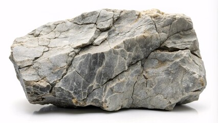 A grey, weathered rock with natural cracks and rough edges displayed on a white background.  
