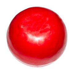 Cheese in a wax shell on a white background.Round cheese covered with wax.Cheese in wax background.