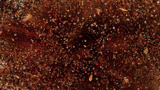 Super Slow Motion Shot Various Spices Mixture Exploding Towards Camera at 1000fps.