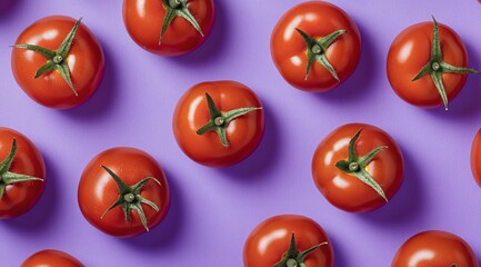 A flat lay of fresh red tomatoes arranged in a repeating pattern on a purple background.
