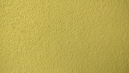 Gold yellow color concrete wall background for texture design. Yellow clean wall texture background.Beautiful concrete stucco. 