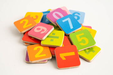 Number wood block cubes for learning Mathematic, education math concept.