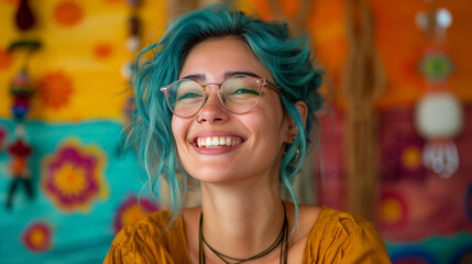 Happy Woman with Blue Hair and Glasses.  A cheerful young woman with vibrant blue hair, wearing glasses and smiling brightly against a colorful background.