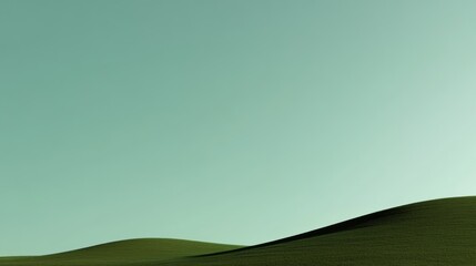 Obraz premium Minimalistic landscape with gentle green hills and a clear sky.