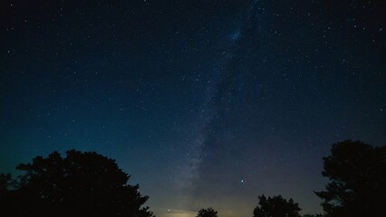 Fototapeta premium The night sky is lit by the moonlight