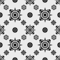 Black and white floral pattern with intricate designs and shapes, perfect for textiles or wallpapers