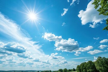 Fototapeta premium Warm blue summer sky with bright sunshine, radiant light, sunny weather