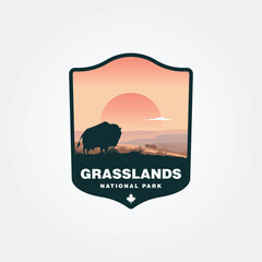 grasslands national park with a bison looking at the sunset vector design, canada national park logo