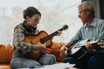 An elderly professor instructs a young student in guitar playing during a music class, fostering...