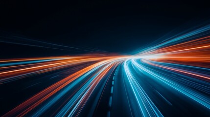 Dynamic Light Trails on a Dark Highway Capturing Motion and Speed Through Vibrant Red and Blue Colors at Night, Ideal for Technology and Transportation Themes