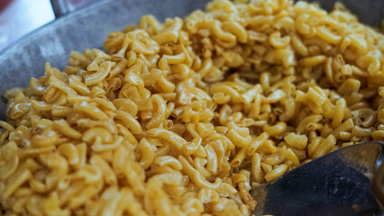 Close-up of classic macaroni and cheese dish with cheese. Macaroni with several flavors