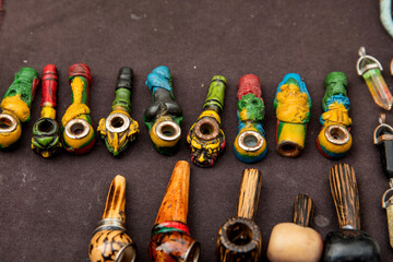 Pipes for smoking marijuana, colored pipes. Pipe for smoking marijuana. Designer accessories for smoking marijuana.Selective focus