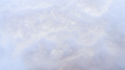 Fresh snow background. Natural winter backdrop. Texture in blue tones