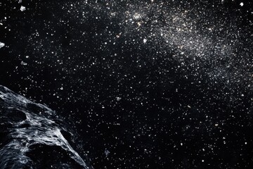 Obraz premium Close-up of an asteroid in space with a starry background.