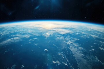 Fototapeta premium Earth from space with sun rising over horizon.