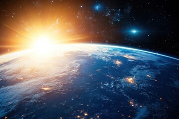 Obraz premium Earthrise over a glowing horizon with stars in the dark sky.