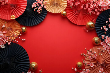 A vibrant arrangement of colorful paper fans with cherry blossom petals, perfect for Chinese New Year celebrations, events, or festive decorations.