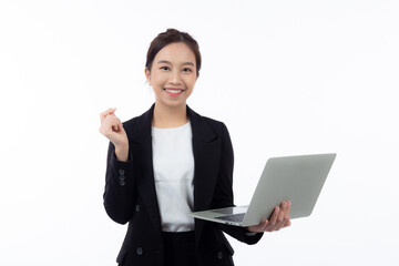 Portrait young asian businesswoman in suit celebrating success while holding a laptop isolated white background, business woman holding notebook expression with achievement and winning.