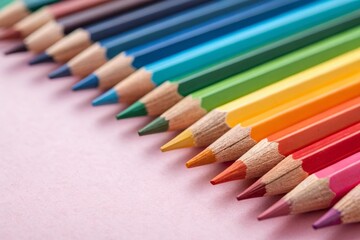 Fototapeta premium Vibrant pencils dance across a soft pastel canvas, perfect for school and creativity.