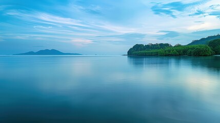Serene Coastal Landscape with Calm Waters and Blue Skies