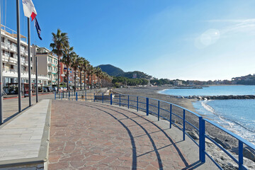 Promenade near sea in resort town of Sestri Levante, Italy, 2024. Nature and recreation. Traditional buildings. Sunny day and clear sky. Ecologically clean nature.