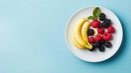 Bananas and mixed berries on a healthy diet plate, weightloss concept